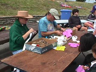 JR and Linda Warner assisting kids make kites